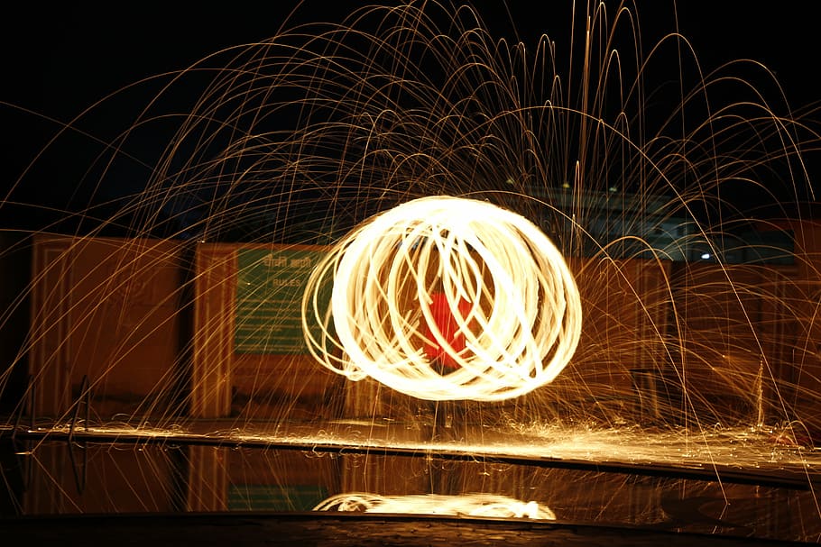 steel wool, fire, light, circle, sparks, glowing, burning, architecture, bouncing, spinning