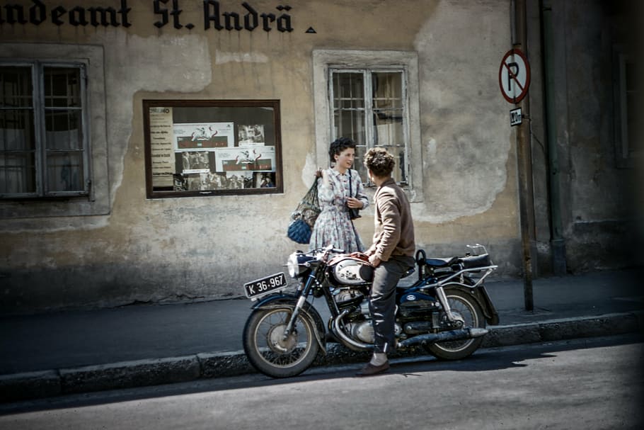 man, riding, motorcycle, parked, road, taking, woman, people, old, building