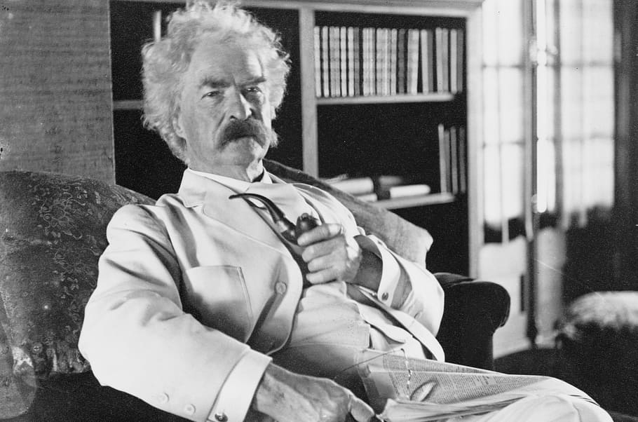 mark twain to the person sitting in darkness