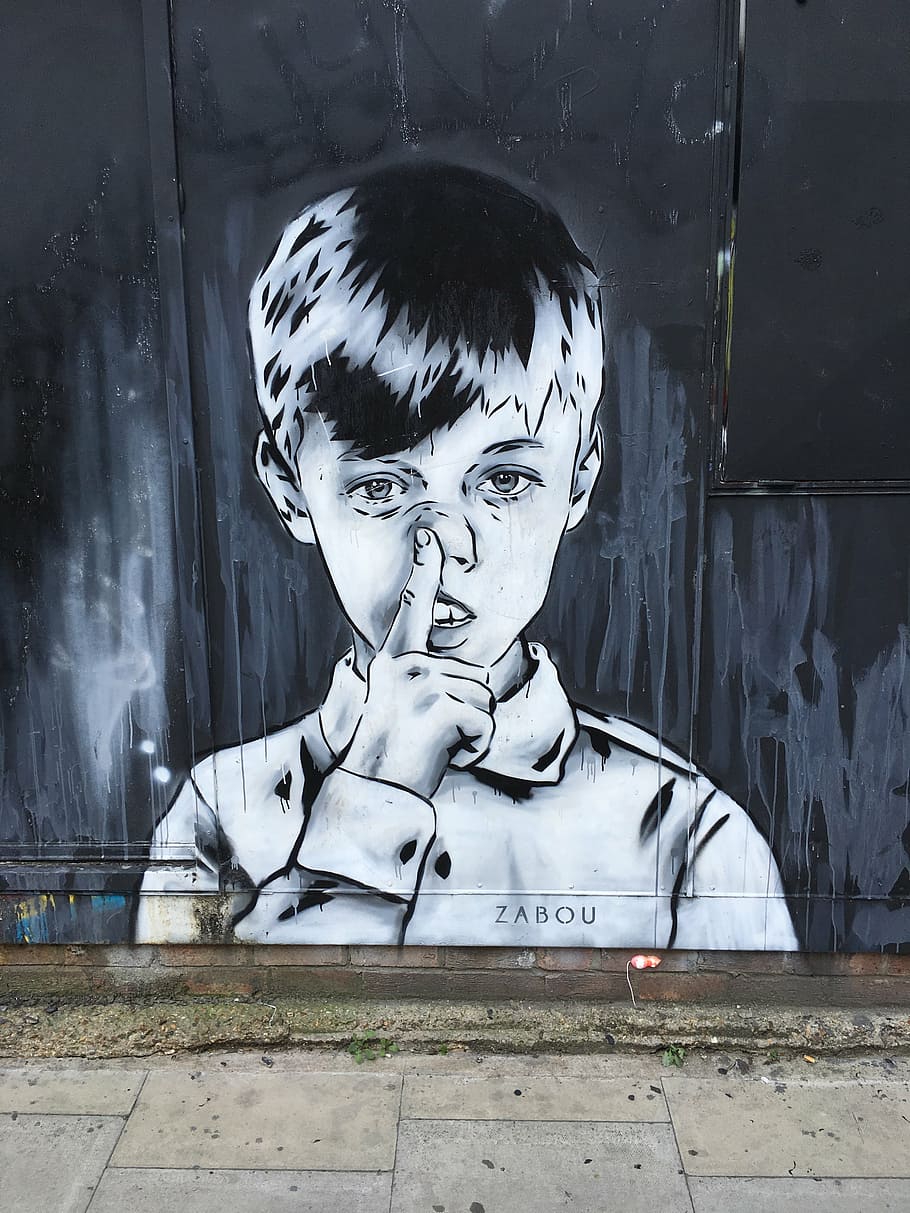 boy, pointing, nos graffiti, zabou, street art, london, brick lane, shoreditch, mural, eastend