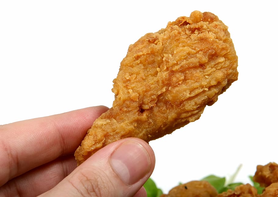 person, holding, fried, chicken, batter, breast, calories, cholesterol, colorful, cooked
