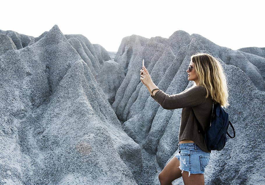 woman, standing, mountain raneg, phone, technology, mountain, dom, rock, travel, hiking