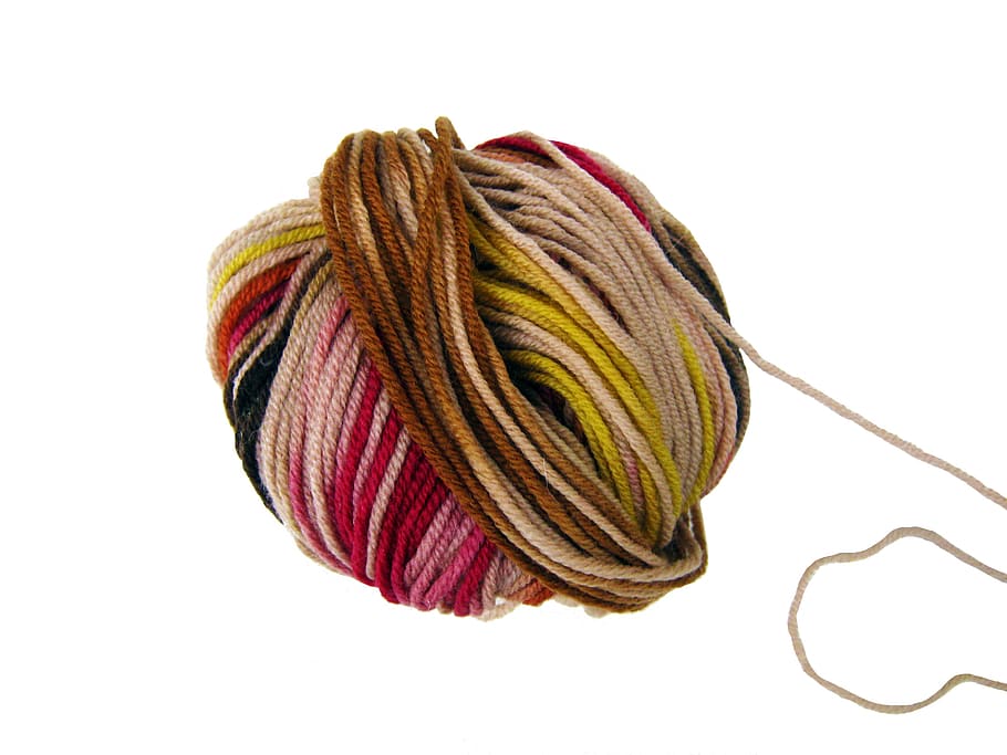 multicolored yarn ball, wool, cat's cradle, knit, colorful, hand labor, isolated, studio shot, white background, indoors