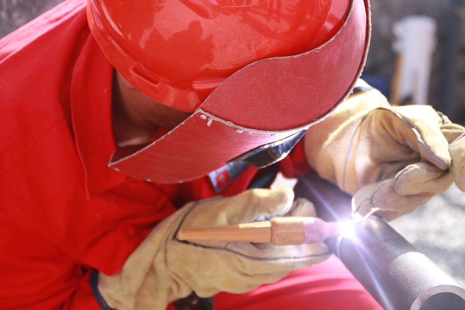 oil workers, welding, pipeline, red, human hand, close-up, human body part, people, holding, adult