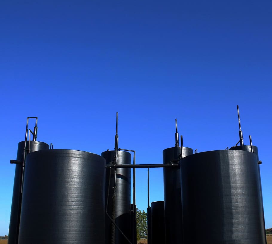 low-angle photography, two, black, industrial, fuel tanks, calm, blue, sky, Tanks, Oil, Industry