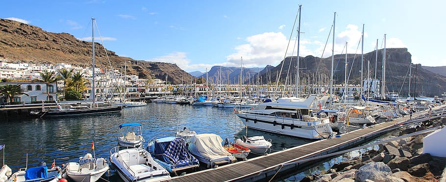 assorted, boats, yachts, water, blue, sky, across, mountain, daytime, puerto de mogan