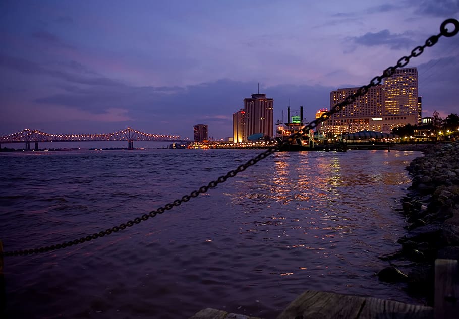 cityscape by water, new orleans, louisiana, city, cities, urban, mississippi river, buildings, architecture, sunset