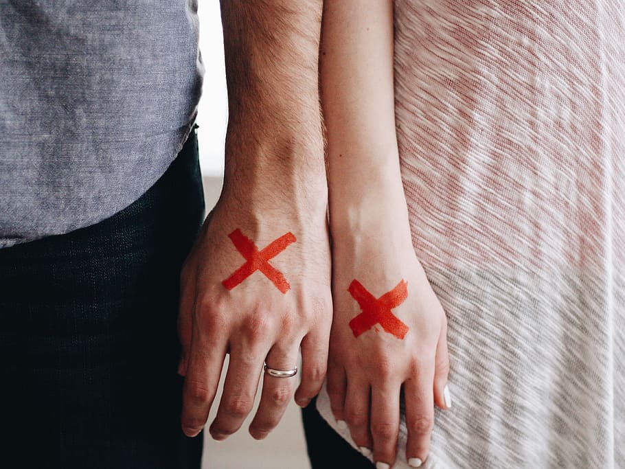 man, woman, wrote, x mark, hands, couple, red x, x, marked, stamped