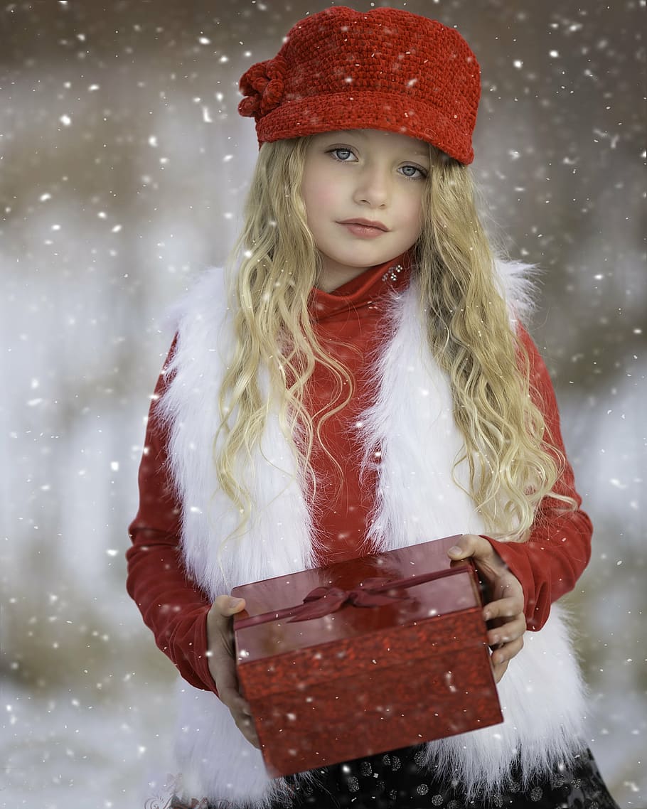 shallow, focus photography, girl, holding, red, box, winter wonderland, snow, cold, season
