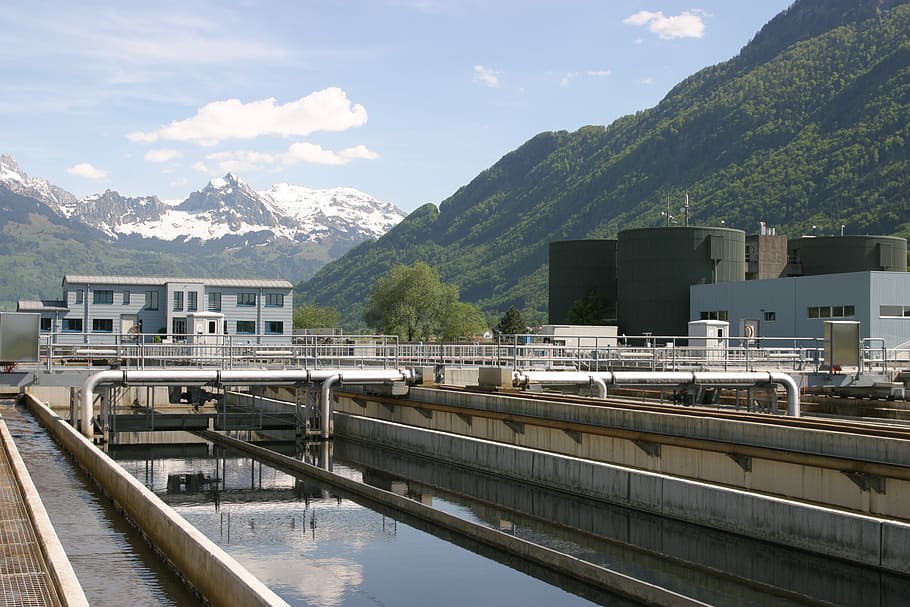 sewage plant, switzerland, wastewater treatment, clarifiers, clear, water, wastewater, environmental protection, clean, mountain