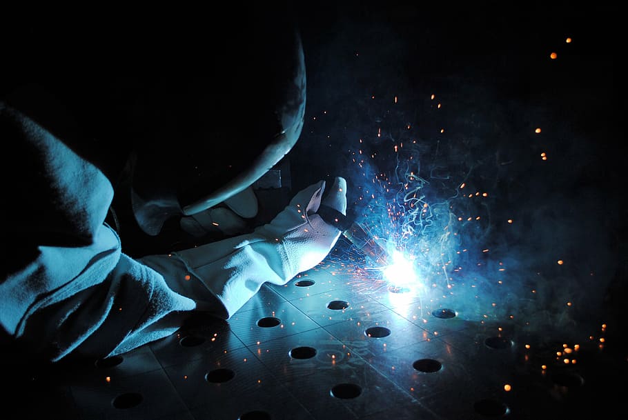 person welding metal, welder, metal, sparks, one person, night, motion, illuminated, smoke - physical structure, blue