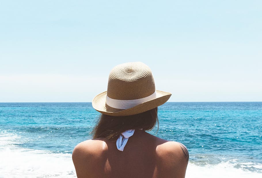 woman, front, body, water, wearing, brown, hat, daytime, halter, top