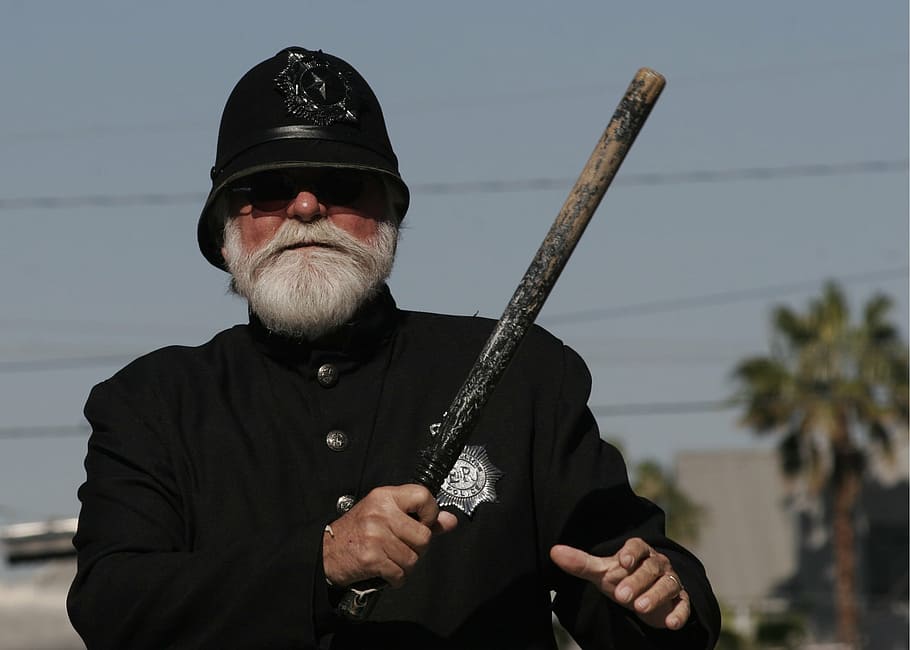 man holding baton, police, policeman, bobby, uniform, male, protect, authority, badge, detective