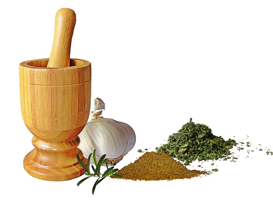 brown, wooden, mortar, pestle, several, spices, head of garlic, cumin, oregano, white background
