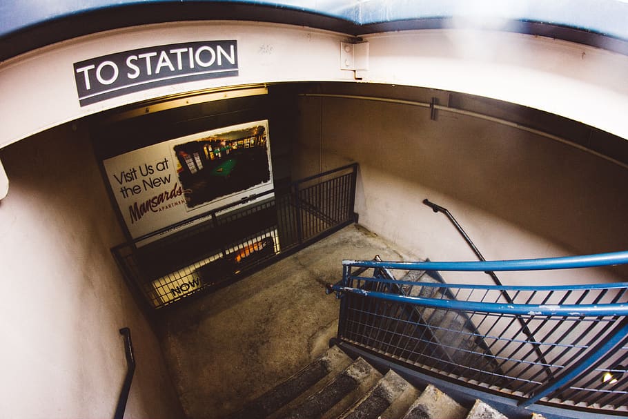 architecture, building, infrastructure, stairs, stairway, advertising, text, railing, communication, western script