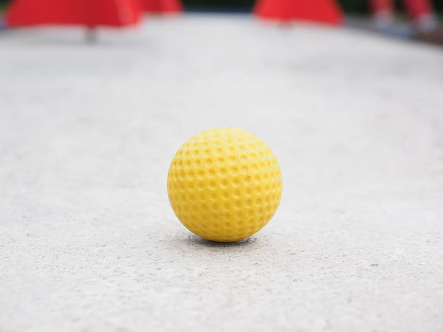 ball, mini golf ball, yellow, checkered, ball guide, miniature golf, minigolf plant, ground golf, skill game, precision sport