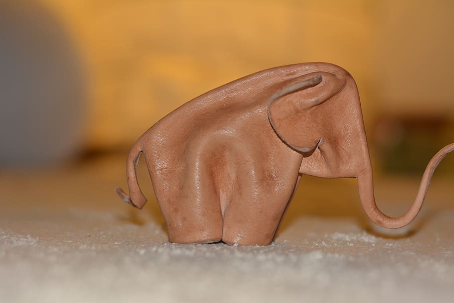 elephant, leather, moulding, still life, close-up, representation, table, selective focus, indoors, art and craft
