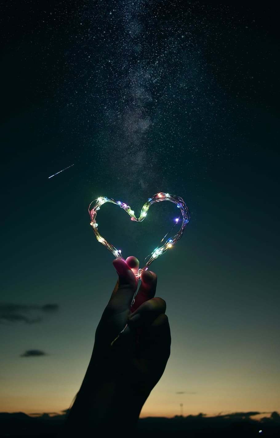 person, holding, heart-shaped string light, nature, sky, star, human hand, hand, human body part, real people