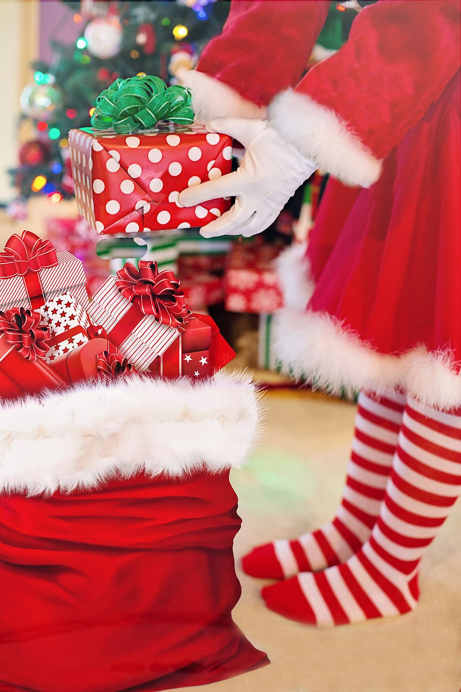 person, wearing, santa costume, holding, giftbox, santa woman, presents, christmas gifts, santa's bag, christmas eve