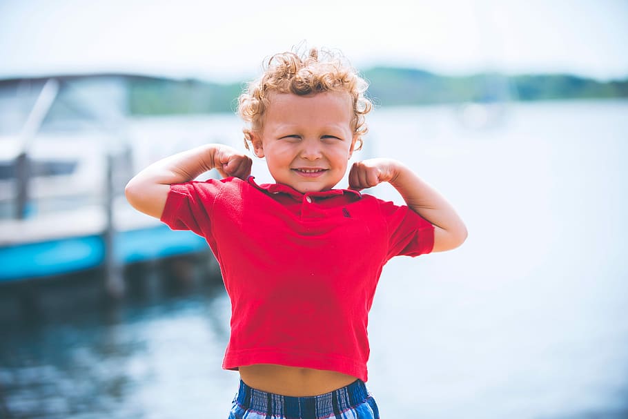 boy, wearing, maroon, polo shirt, body, water, daytime, body of water, child, outdoors