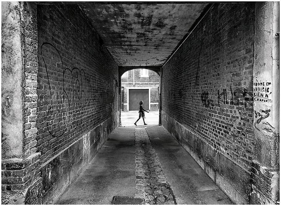 woman walking on hallway, architecture, built structure, real people, full length, walking, one person, tunnel, direction, the way forward