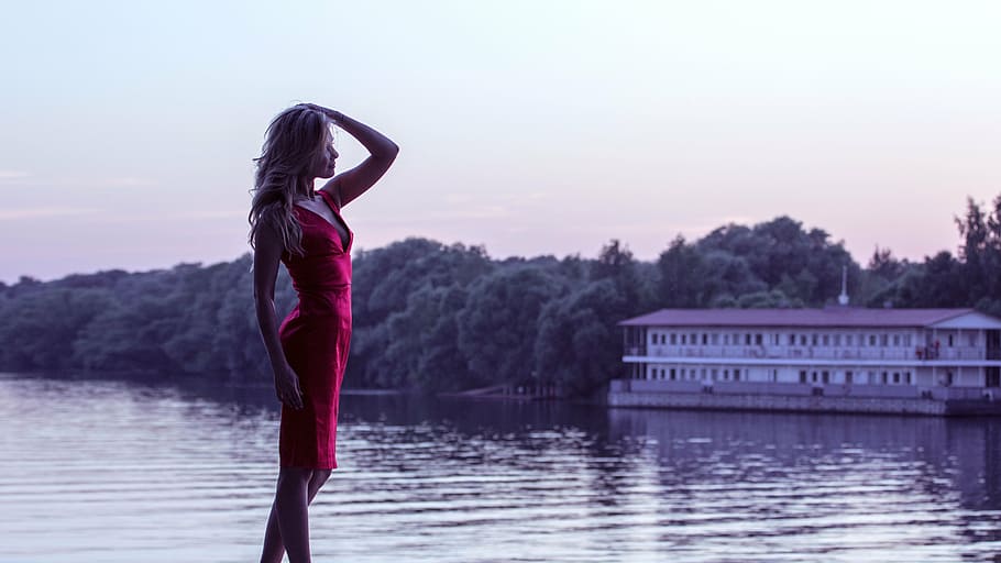 woman, wearing, red, mini dress, standing, body, water, golden, hour, girl in red dress