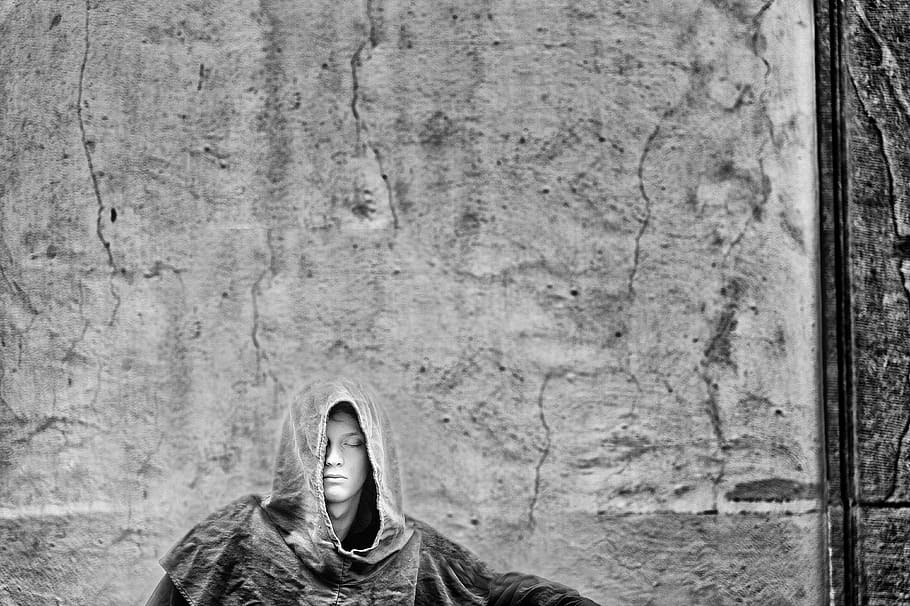person, robe infront, wall, mimo, city, truism, prague, black and white, hooded shirt, adult