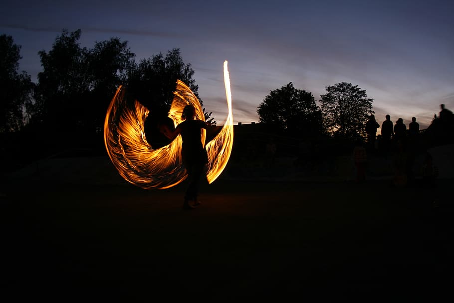 art, fire, artist, fire show, real people, lifestyles, silhouette, one person, sky, tree