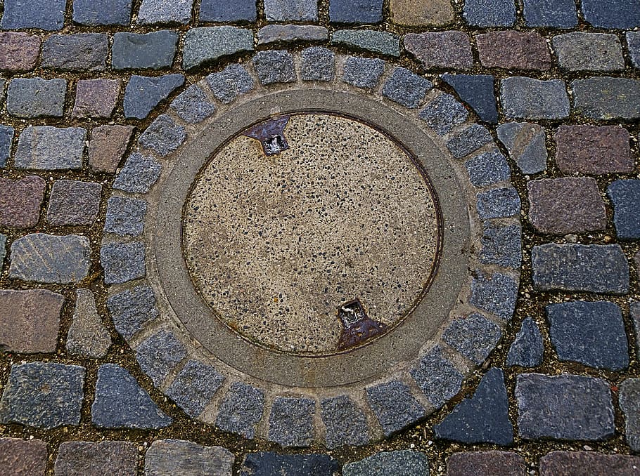 manhole cover, rusty, round, cobblestones, road, background, metal, cast iron pans, old, geometric shape