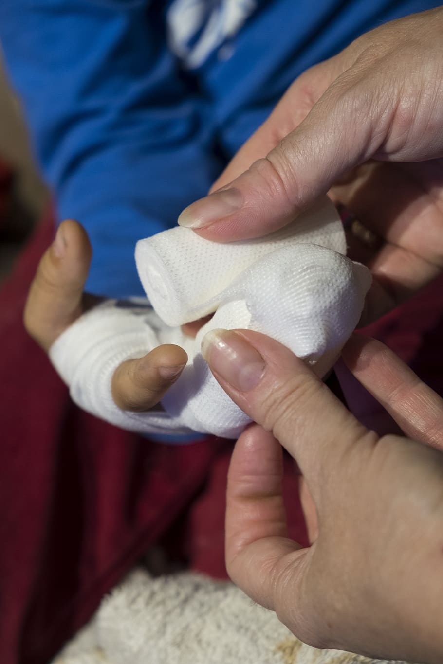 person, holding, white, gauze, child, boy, injury, injured, association, bandages
