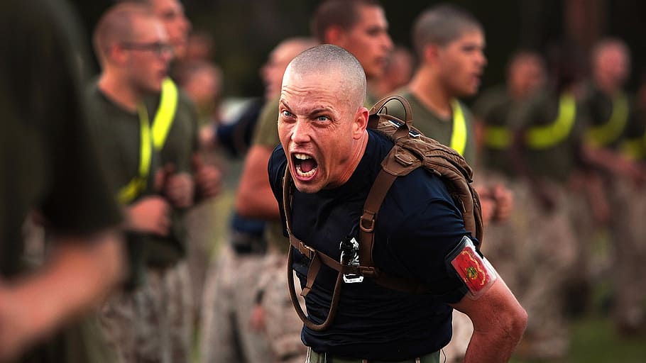 man, carrying, backpack, making, face, military, drill instructor, instructions, training, teach