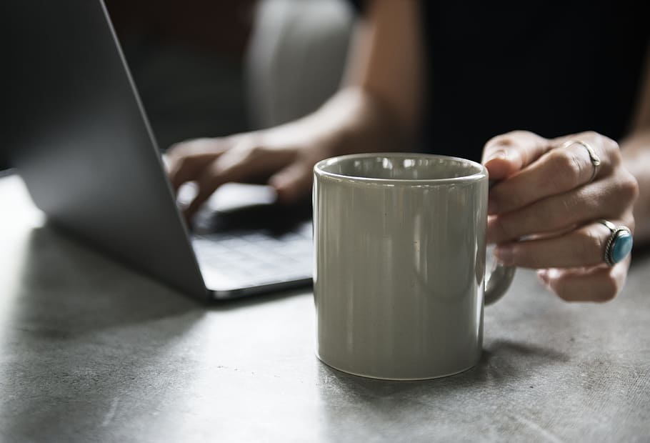 person, using, laptop computer, reach, ceramic, mug, beverage, cafe, coffee, coffee shop