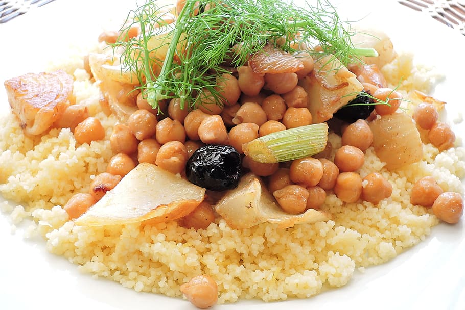 cooked, rice, topped, beans, round, white, ceramic, plate, citrus couscous, chick peas