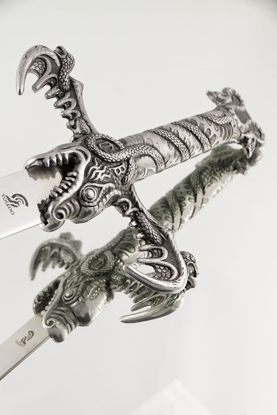 close-up photography, gray, sword, handle, ornament, weapon, knife, fight, indoors, art and craft