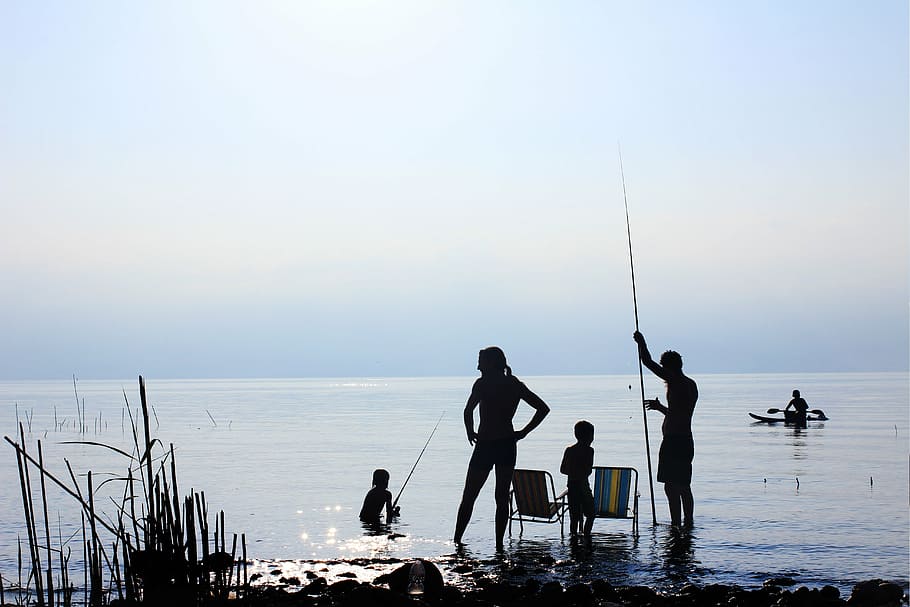 silhouette photo, four, person, holding, fishing rods, sea, ocean, water, waves, nature