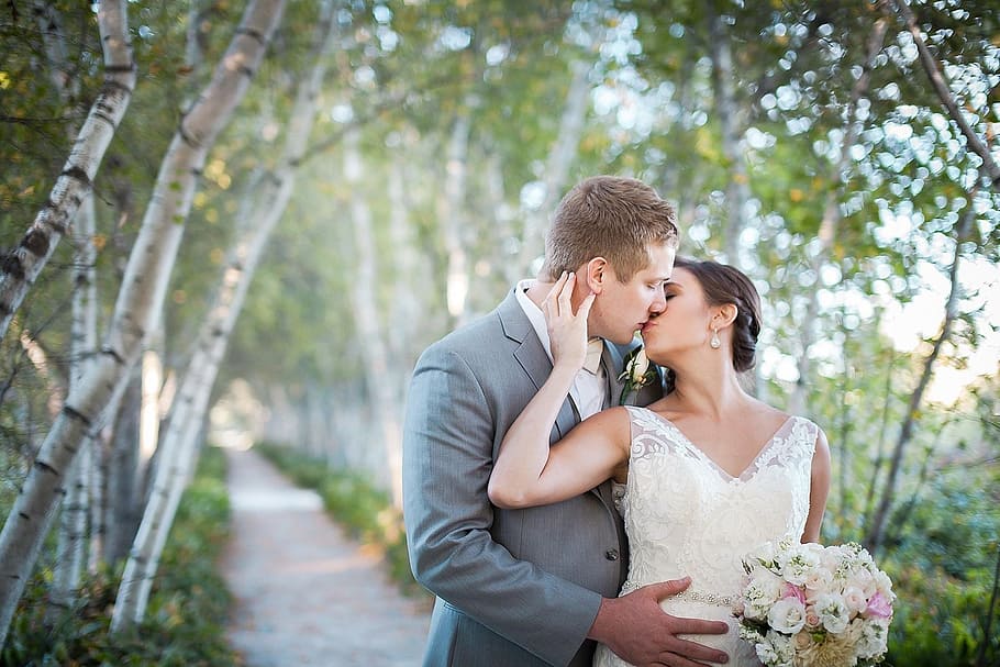 man, kissing, woman, wearing, white, wedding dress, love, nature, outdoors, couple