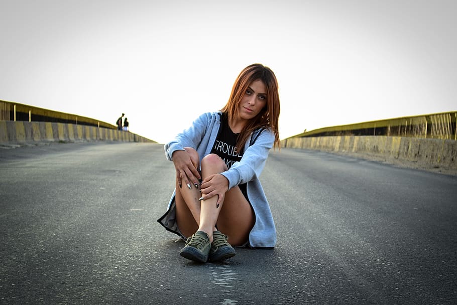 girl, bridge, highway, outdoor, attractive, road, casual clothing, sitting, full length, portrait