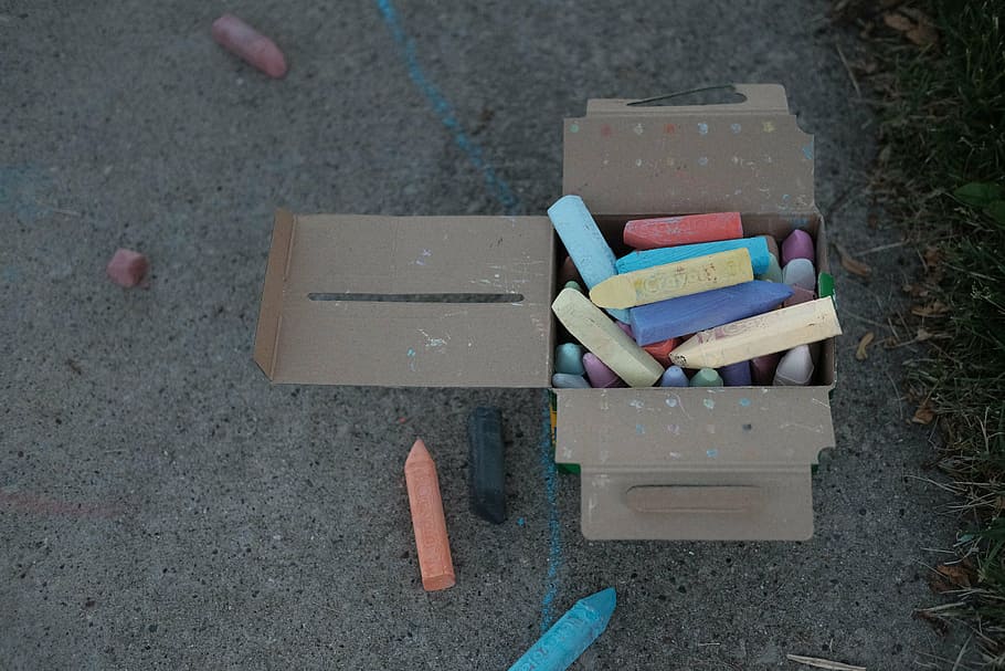 assorted-color chalks, brown, cardboard box, assorted, chalks, box, chalk, crayons, pavement, drawing