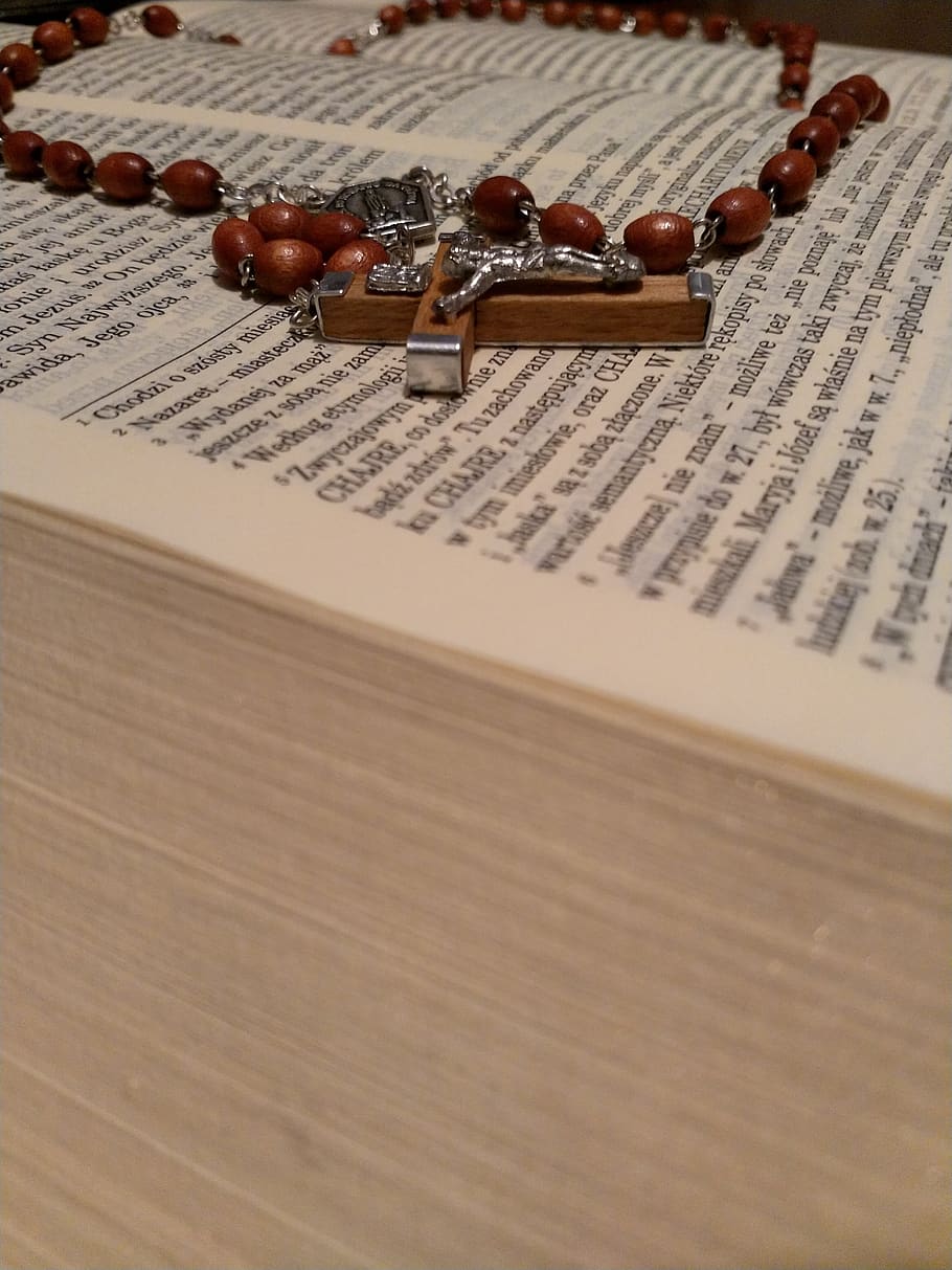the rosary, prayer, bible, arts culture and entertainment, music, wood - material, musical instrument, sheet music, sheet, table