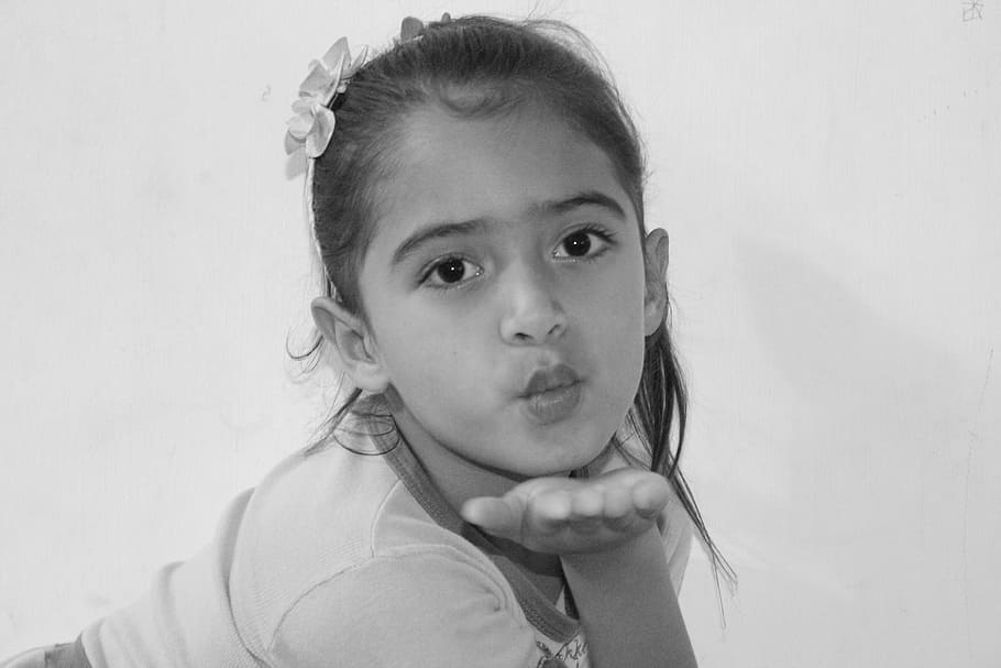 grayscale photo, girl, wearing, shirt, peck, little girl, sending kiss, child, childhood, portrait