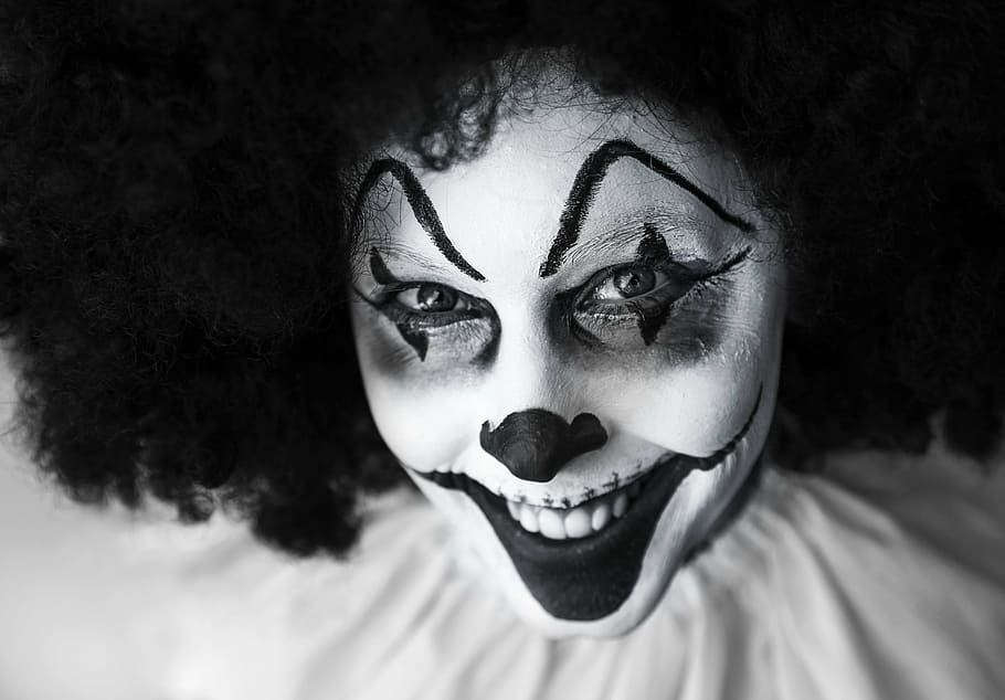 grayscale clown photo, clown, creepy, grinning, facepaint, portrait, headshot, one person, fear, adult