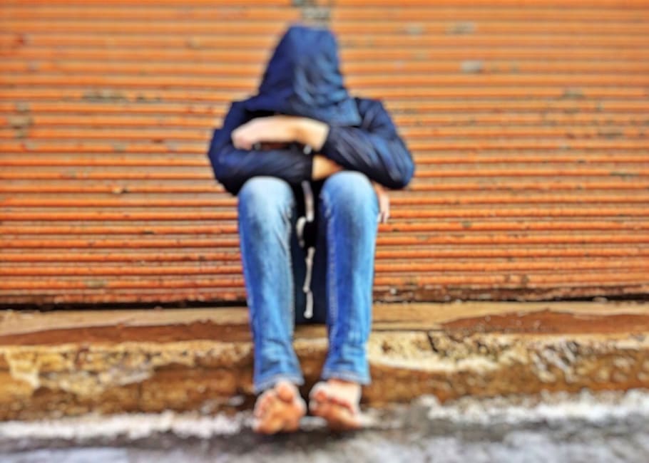 person, wearing, hoodie, sitting, brown, background, Homeless, Lost, Bullied, Youth