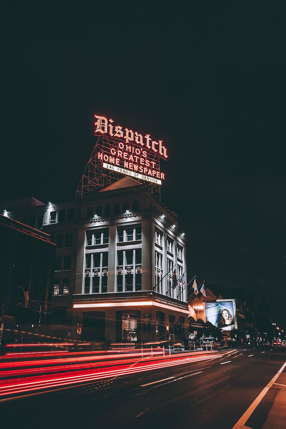 dispatch building, nighttime, disputch, neon, billboard, white, concrete, building, landmark, dark