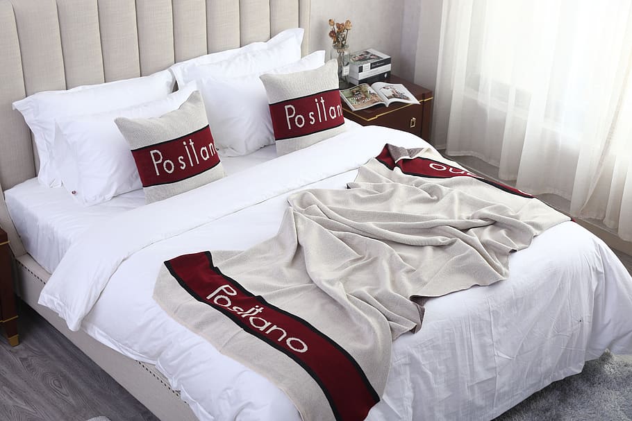 bedding, pillowcases, bed tail towel, four-piece set, text, white color, western script, healthcare and medicine, indoors, high angle view