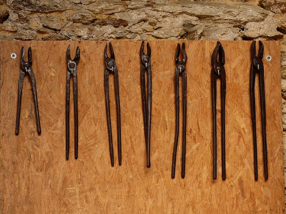 tools, field, tongs, tradition, wood - material, metal, brown, side by side, indoors, still life