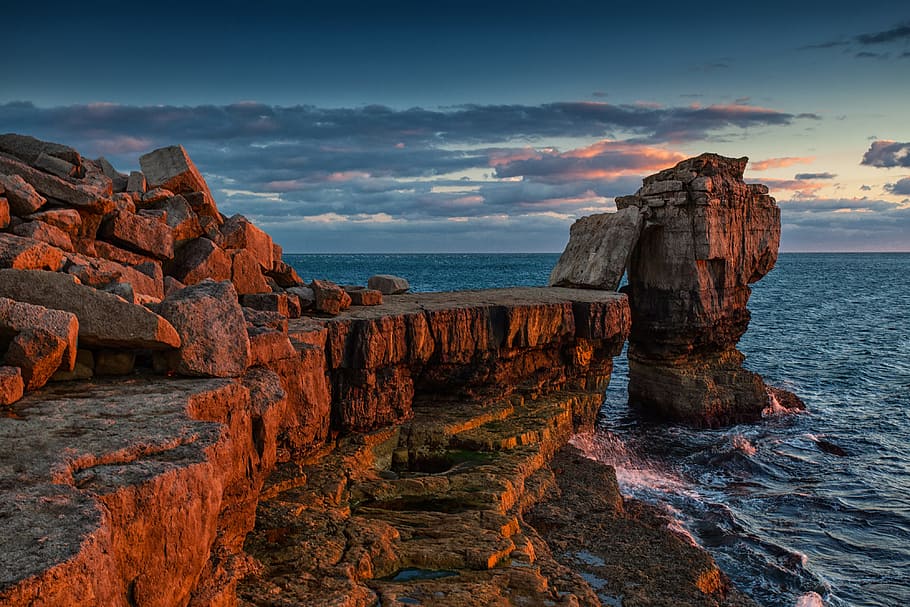 landscape shot, taken, sunset, rugged, rock formations, coast, isle, portland, southernmost, point