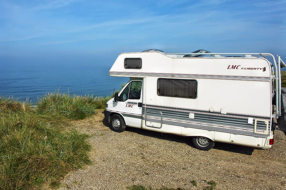 mobile home, camper on the beach, beach, cliffs, holiday, camping, camping holidays, travel, camper, outdoor