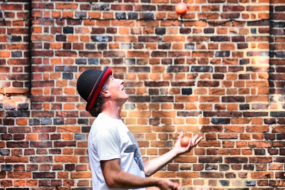 juggler, brick, wall, acrobatic, catching, circus, performer, brick wall, one person, hat