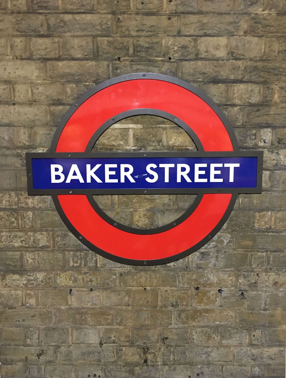 bakerstreet, london, sherlock holmes, metro station, communication, sign, circle, geometric shape, text, wall - building feature