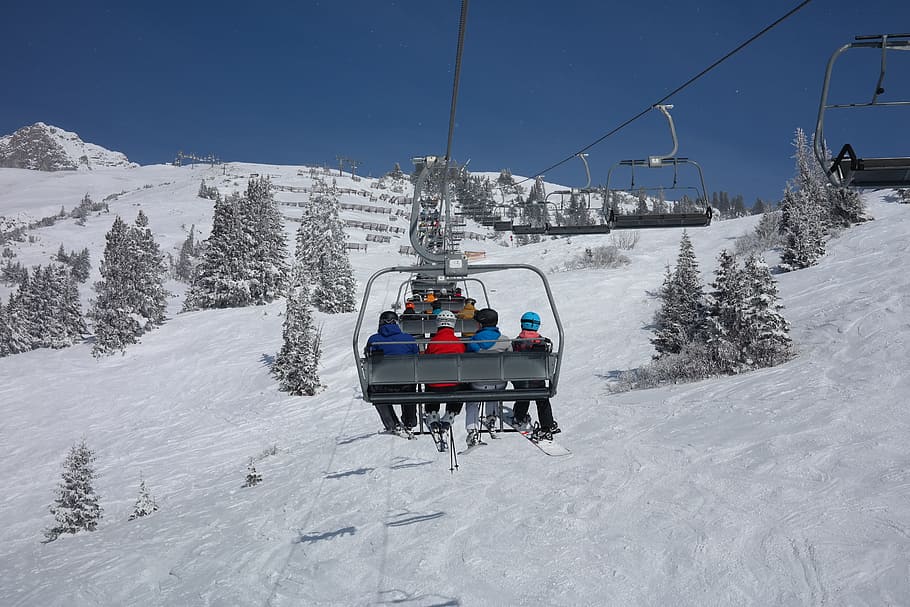 people, riding, cable cart, facing, mountain, daytime, ski lift, chairlift, ski area, arlberg